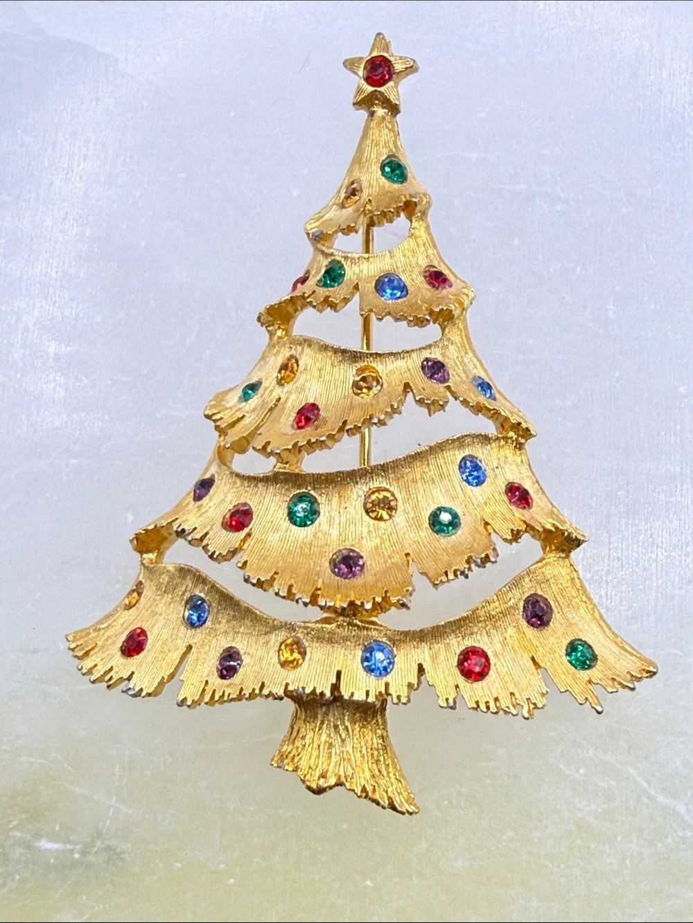 Vintage JJ Gold-tone Christmas Tree Pin with Multicolored Rhinestones
